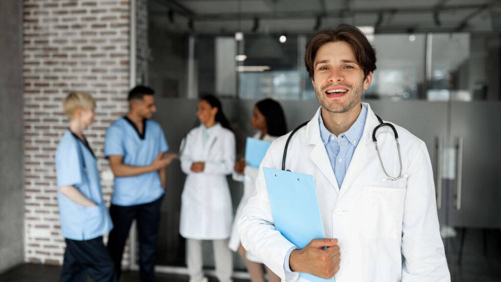medical students smiling at camera